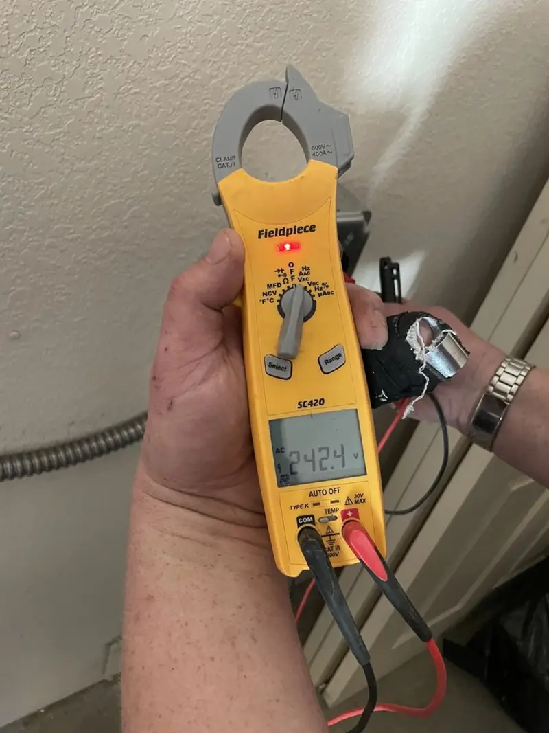 Voltage testing with clamp meter during Whole House Surge Protector in Carlyss